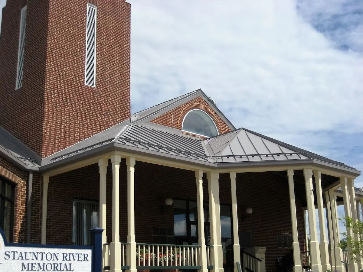 Skilled roofing craftsmen working on a residential roof in Brownstown